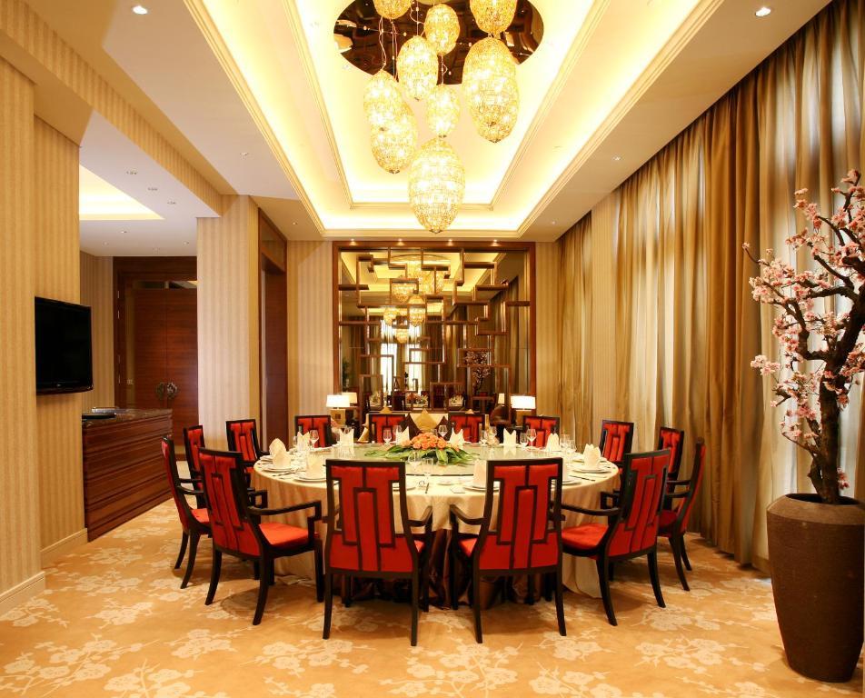 Landison Green Town Hotel Xinchang Экстерьер фото